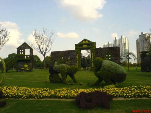 вот такие сады в китае (Фигурно постриженые кусты, деревья и не только)